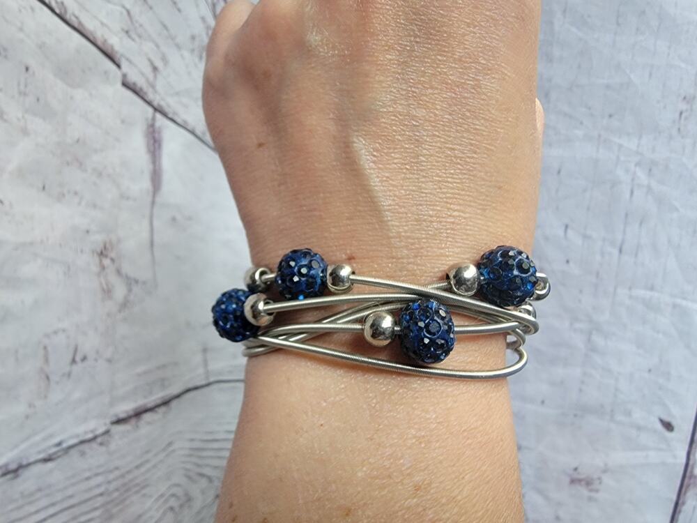 Silver Color Stretch Wire Magnetic Bracelet With Blue and Silver Colored Beads